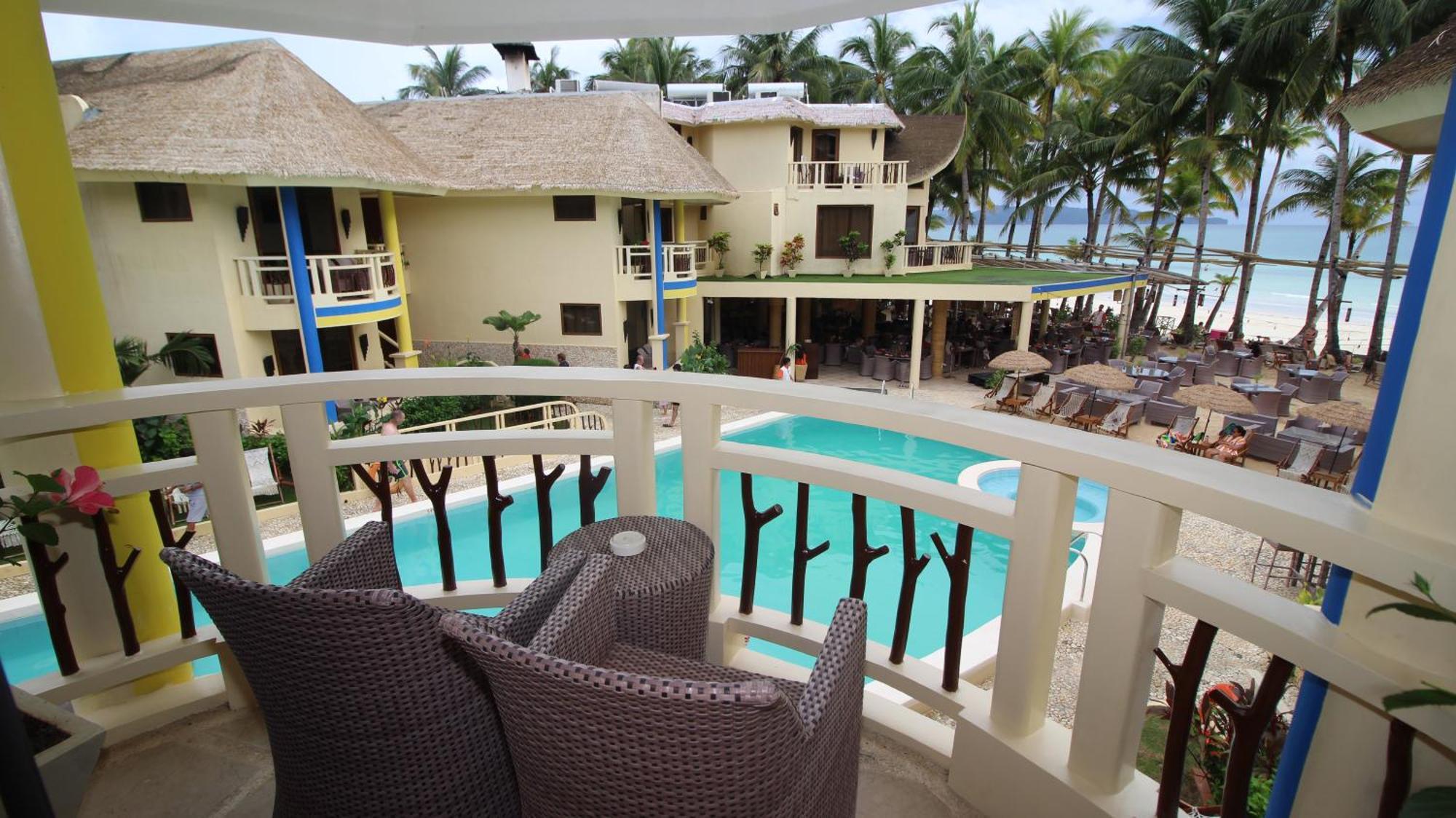 Ambassador In Paradise Balabag  Extérieur photo View of the pool at the resort